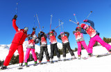 Moniteur de ski et skieurs